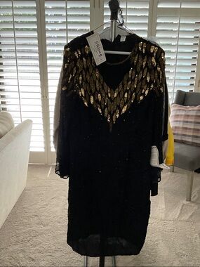 Vintage 80s/90s Stenay dress size 16 with tags.  PTP.22  Length 44